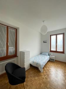 Postel nebo postele na pokoji v ubytování Residence Gaggiole, apartment 3
