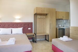Een bed of bedden in een kamer bij PANORAMA ROOM APARTMENs