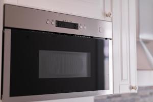 A kitchen or kitchenette at The closest to the Boboli Gardens