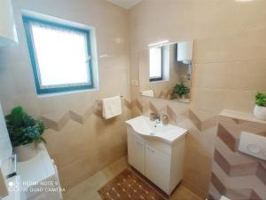 Posezení v ubytování Apartment Milotić + 30 fotografií