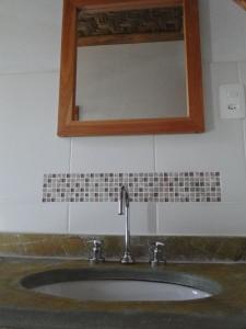 Kylpyhuone majoituspaikassa Pousada Do Pequi