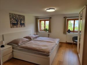 Postel nebo postele na pokoji v ubytování Ferienhaus Christian