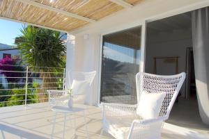 A balcony or terrace at Evgenia Seafront House