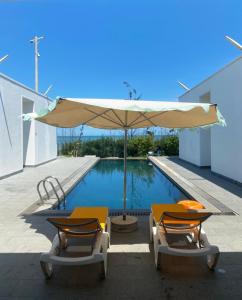 Der Swimmingpool an oder in der Nähe von Okinawa Villas and Beach Club - Oceanami Resort