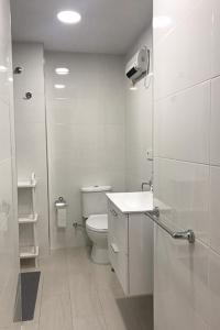 Een badkamer bij LIA Habitaciones