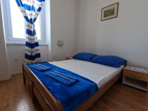 Postel nebo postele na pokoji v ubytování Hostel Adria