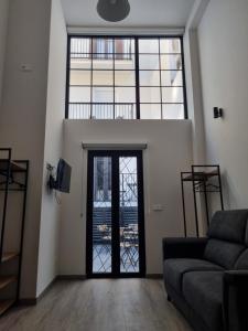Televízia a/alebo spoločenská miestnosť v ubytovaní Kabialde Apartamentuak TSS00134