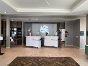 The lobby or reception area at Holiday Inn Greenville - Woodruff Road, an IHG Hotel