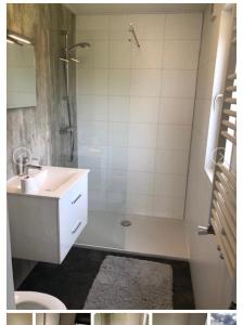 een badkamer met een wastafel, een douche en een wastafel bij Rhederlaagse Meren in Lathum