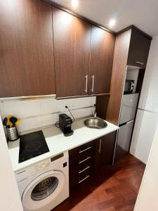 Kuchyňa alebo kuchynka v ubytovaní Marinac3 Precioso apartamento con patio en el centro histórico de Málaga + 11 fotografií