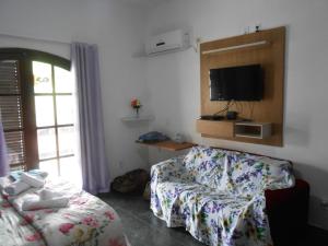 TV a/nebo společenská místnost v ubytování Nacif's Suites