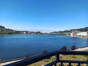 a view of a river from a balcony at Ría de Viveiro 2 in Viveiro