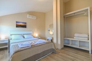 Postel nebo postele na pokoji v ubytování Apart-Hotel Onegin & Thermal Zone