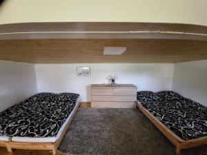 Postel nebo postele na pokoji v ubytování Apartmán u kolejí I