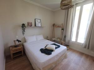 Posteľ alebo postele v izbe v ubytovaní Appartement, 3 pièces, Villa Monte Europa