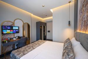 Postel nebo postele na pokoji v ubytování World Class Hotel - Istanbul Airport