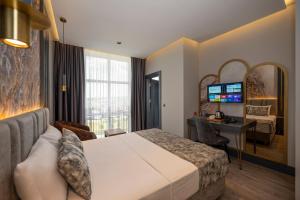 Postel nebo postele na pokoji v ubytování World Class Hotel - Istanbul Airport