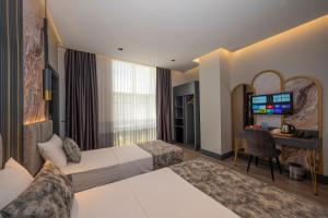 Postel nebo postele na pokoji v ubytování World Class Hotel - Istanbul Airport