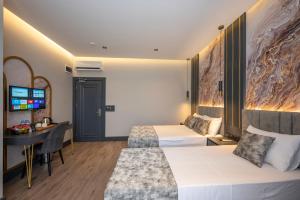 Postel nebo postele na pokoji v ubytování World Class Hotel - Istanbul Airport