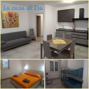 a living room and a kitchen with a couch and a table at La casa di Isa in Maracalagonis