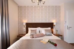 Letto o letti in una camera di Rooms Valery