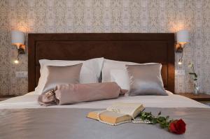 Letto o letti in una camera di Rooms Valery