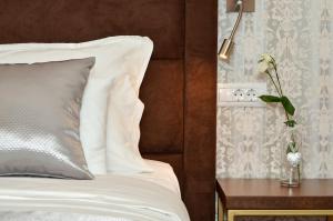Letto o letti in una camera di Rooms Valery