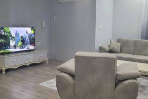 Ruang duduk di Lovely 2-bedroom apartment