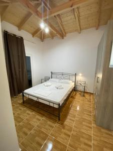 Ένα ή περισσότερα κρεβάτια σε δωμάτιο στο Babis Apartment Agios Nikitas