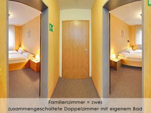 Giường trong phòng chung tại Hotel Keinath Stuttgart