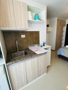 Kuchyň nebo kuchyňský kout v ubytování Estudio elegante y cálido