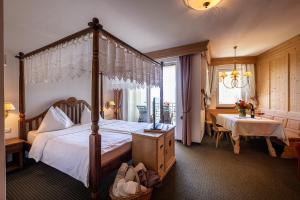 Postel nebo postele na pokoji v ubytování Hotel Finkennest - Panoramic Garden Resort