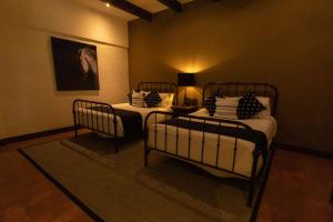 Postel nebo postele na pokoji v ubytování Hacienda El Salitre Hotel & Spa
