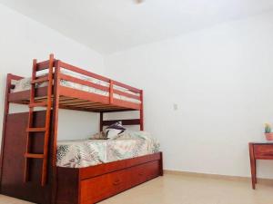 Letto o letti in una camera di Hermosa casa Tuxpan con Aire Acondicionado 2BED 1BATH