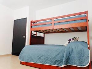 Letto o letti in una camera di Hermosa casa Tuxpan con Aire Acondicionado 2BED 1BATH