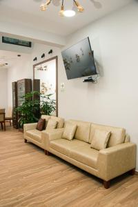 TV a/nebo společenská místnost v ubytování Platero Hotel