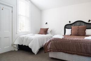 Ένα ή περισσότερα κρεβάτια σε δωμάτιο στο Luxury Apartment on Stuart