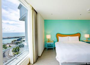 Voodi või voodid majutusasutuse Kenting Long Beach Hotel toas