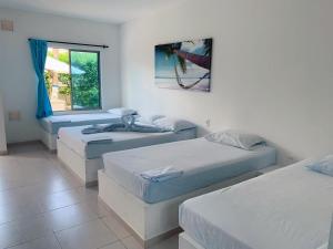 Ένα ή περισσότερα κρεβάτια σε δωμάτιο στο Blue Apartahotel