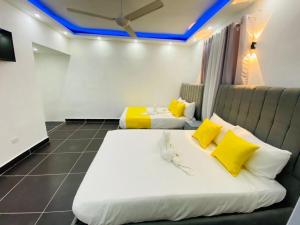 Postel nebo postele na pokoji v ubytování Hotel Reloj