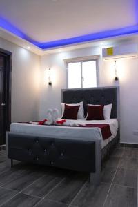 Postel nebo postele na pokoji v ubytování Hotel Reloj