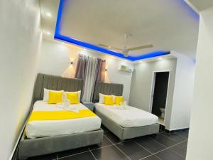 Postel nebo postele na pokoji v ubytování Hotel Reloj