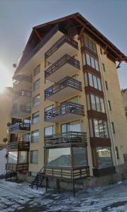 a building with balconies on it in the snow at La Parva Dpto in Farellones