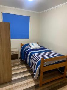 Cama ou camas em um quarto em Hostal El Salitre