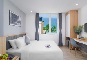 Tempat tidur dalam kamar di Davue Hotel by THG