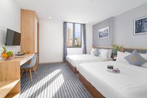Tempat tidur dalam kamar di Davue Hotel by THG