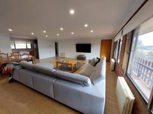 House Matterhon 3 Bedroom Apartment tesisinde bir oturma alanı