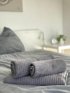 A bed or beds in a room at Wohnung in idyllischer Lage auf Borkum