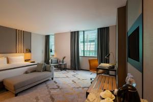 Cama ou camas em um quarto em Anara Airport Hotel