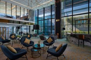Uma área de estar em Anara Airport Hotel